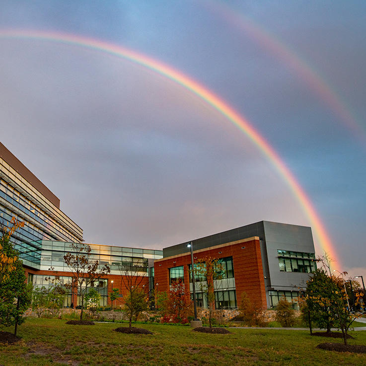 A rainbow vaults over Mason's Peterson Hall on the Fairfax campus.
